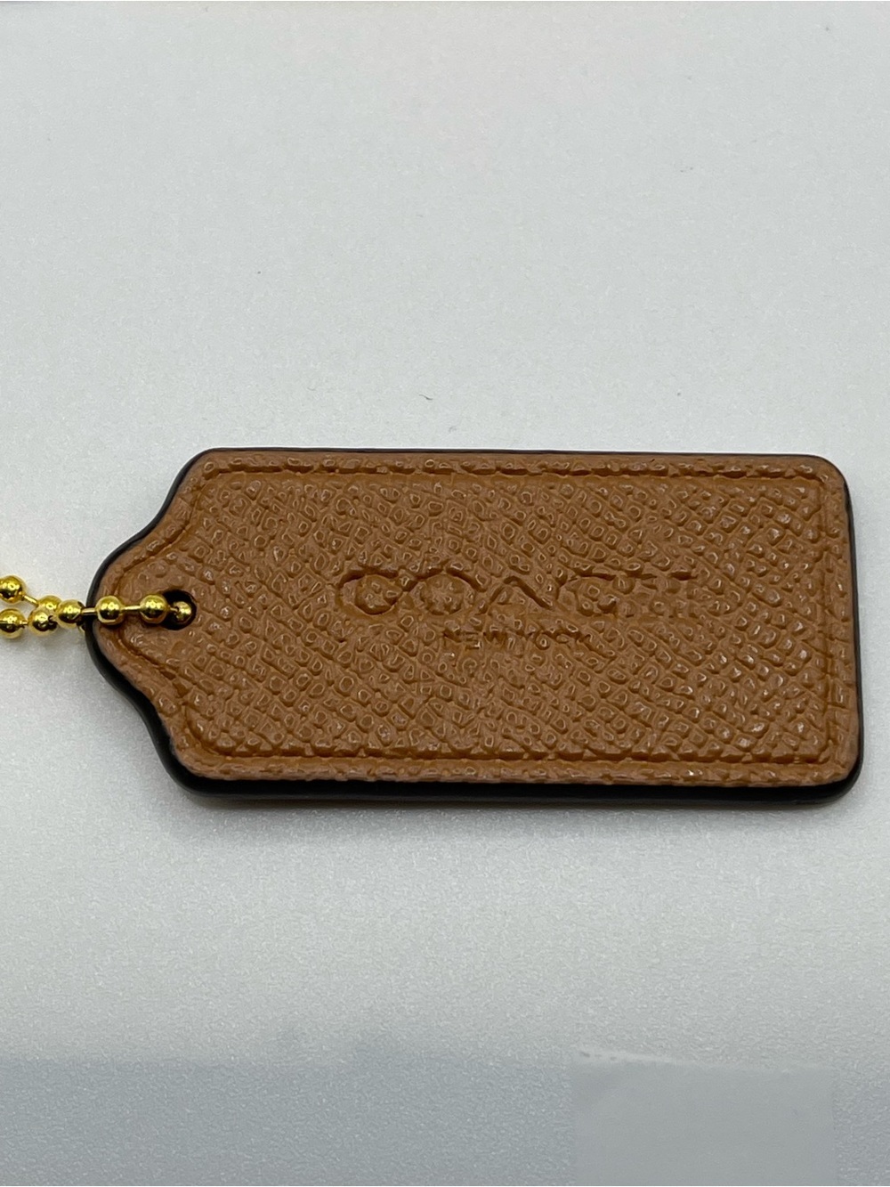 Coach Tan Pebbled Leather Hang Tag with Gold Chain
